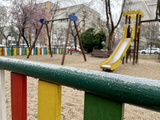 Colorful children's playground on rainy day