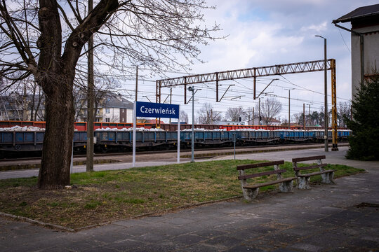 Blue sign with a "Czerwiensk" text in Czerwiensk, Poland in cloudy sky background