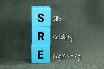 colored cubes with the letter SRE or the word site reliability engineering