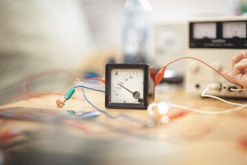 Selective of an ammeter on a table
