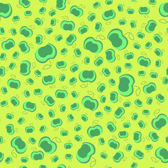 Pattern with apples on a green background.