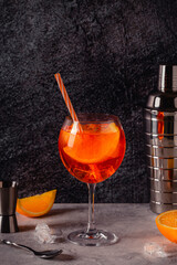 Glass of cold Aperol spritz cocktail.