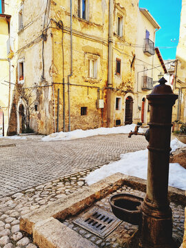 Vertical shot of an old fountain in the historic town of Pescina, L'Aquila, Abruzzo, central Italy
