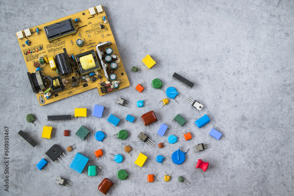 Poster top view of a motherboard, isometric processor and microchip parts on a gray surface
