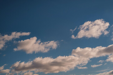 Blue sky background with white striped clouds. blue sky panorama may use for sky replacement