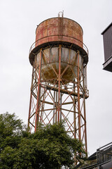 Close-up of an old abandoned city water tower