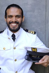 Attractive ship captain with elegant uniform 
