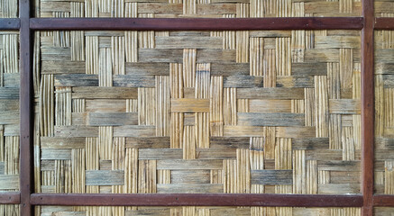 antique room wall made of woven bamboo