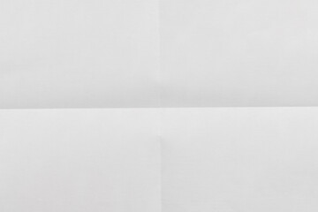 Texture of folded white paper as background