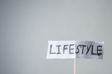 Lifestyle,word written on a piece of paper,soured white background