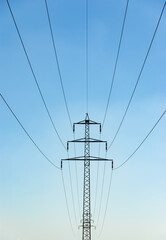 Powerlines under a clear blue sky, rural Czech Republic