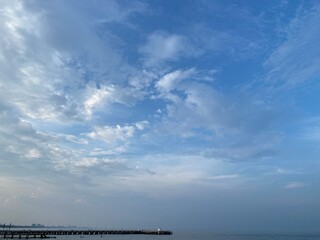 Obraz premium Copy space on the beautiful blue sky over the sea. Fresh air. Good weather.