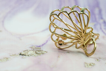 beautiful golden hair clip isolated from the background
