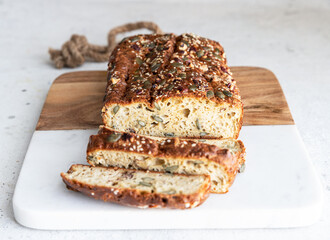 A healthy and very simple recipe for  bread made without gluten usingtahina paste  sesame , nuts and pumpkin seeds. 