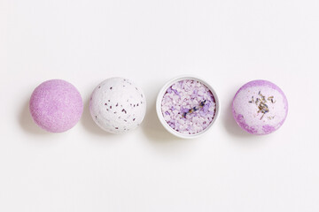 Natural bath bombs and sea salt with lavender essential oil, spa products with dry herbal...