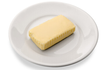 Piece of centrifuged butter in white dish isolated on white