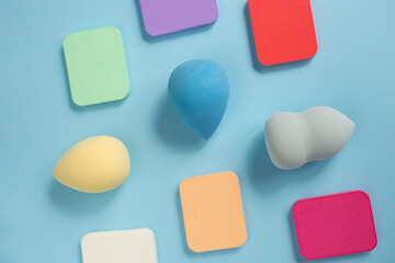 Top view of different cosmetics sponges,all types and forms.Good as cosmetic background.