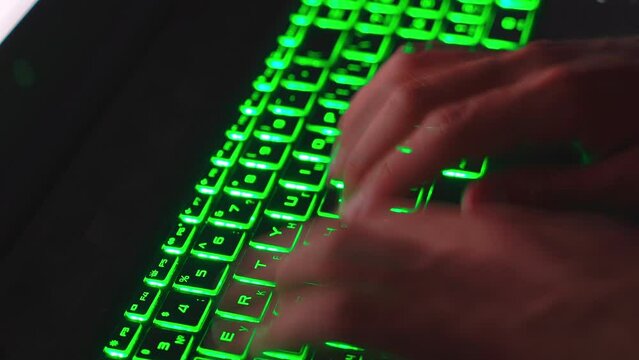 Typing and pressing buttons on computer keyboard. Modern tech and digital network world