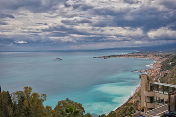 Panorama of the touristic city of Taormina, located in eastern Sicily.