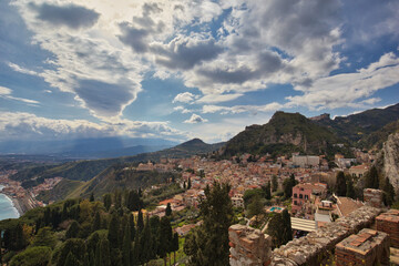 Fototapeta na wymiar Panorama of the touristic city of Taormina, located in eastern Sicily.
