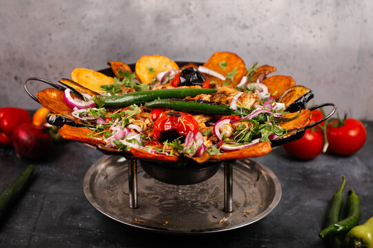 Sadj. Traditional dish of Azerbaijani cuisine. Mix of meat and vegetables. Lamb Meat Saute Coban Kavurma.