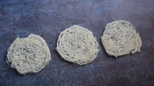 Raw whole dried round string hopper rice noodles