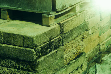 A stack of clay bricks.Material for construction.