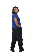 Fototapeta premium man turning with sportswears on white background