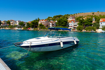 Fototapeta na wymiar Croatia. Summer. Sunny day. Coast of the Adriatic Sea. Yacht parking near a small town by the sea. Holiday season. Popular tourist spot