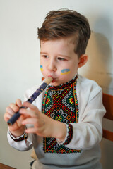 little child playing with toy