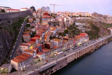 Fototapeta na wymiar Panorama of Old Town of Porto from bridge Ponte Dom Luis I in evening light. Portugal