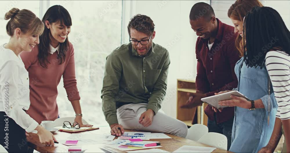 Poster everyones input counts. 4k video footage of a group of young work colleagues having a meeting and di