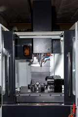 Metal processing machine. Detail of a tool in production