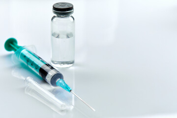  Vaccine in vial with syringe