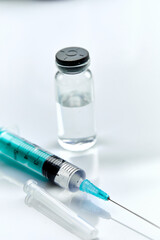  Vaccine in vial with syringe