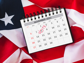 United States Elections. Beautiful invitation card for election day on the background of the US flag. Closeup, no people