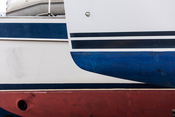Row of laid up sailboats longing for the spring.
