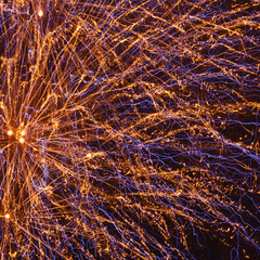 Colorful salute in the sky of St. Petersburg against the background of the night city