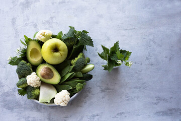 Green vegetables and fresh fruits containing vitamin K. Foods rich in vitamin K, minerals and...