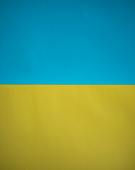 Abstract blue yellow background. Colors of the flag of Ukraine. Textured paper