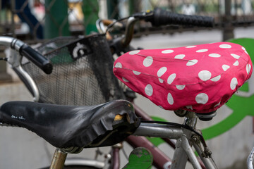 old colorful pink saddles, bicycle decoration