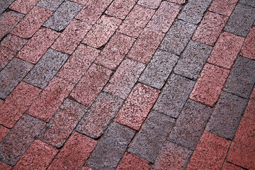 The pattern of a pink old concrete outdoor walkway