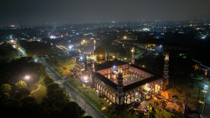 The Largest Mosque Masjid Kubah Emas at Depok at night, Ramadan Eid Concept background, Travel and tourism. Depok, Indonesia April 21 2022