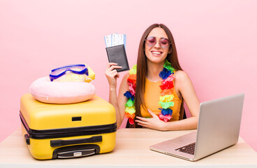 hispanic pretty woman laughing out loud at some hilarious joke. tourist and travel concept