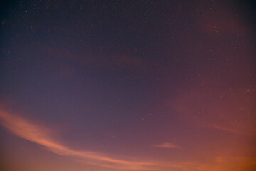 Fototapeta na wymiar Warm colors background Real sunset Night Sky Stars. Natural Starry Sky Background.