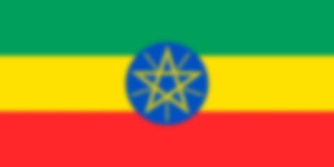 Ethiopia  flag. ET patriotism logo banner. Ethiopia  national symbol. State banner of capital  Addis Ababa . Nation independence day ETH. Blurred flag, Gaussian focus blur effect. 2D Image