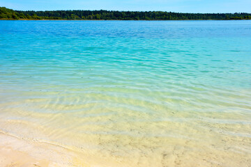 Obraz premium Russian Maldives - lake (quarry) Donzo in the Leningrad region of St. Petersburg, Russia. The purest water, the source of the Oredezh River