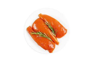 Marinated chicken fillet in red sauce on an isolated background.Fast food, food at home.Top view. Copy space.