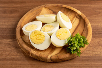 Sliced ​​boiled eggs on the table.