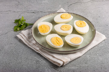 Sliced ​​boiled eggs on the table.